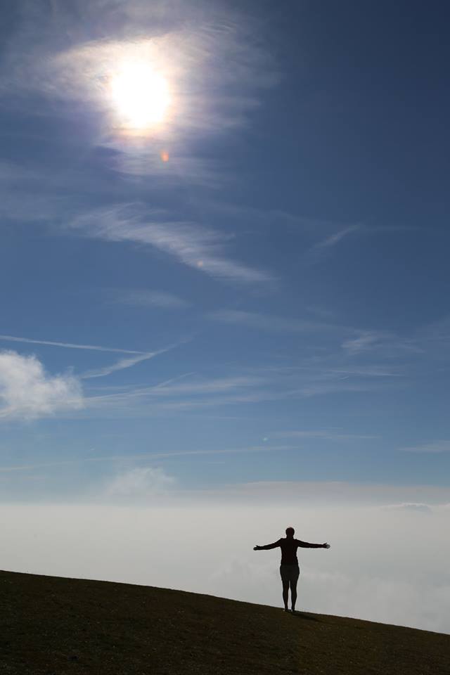 girl standing on mountain