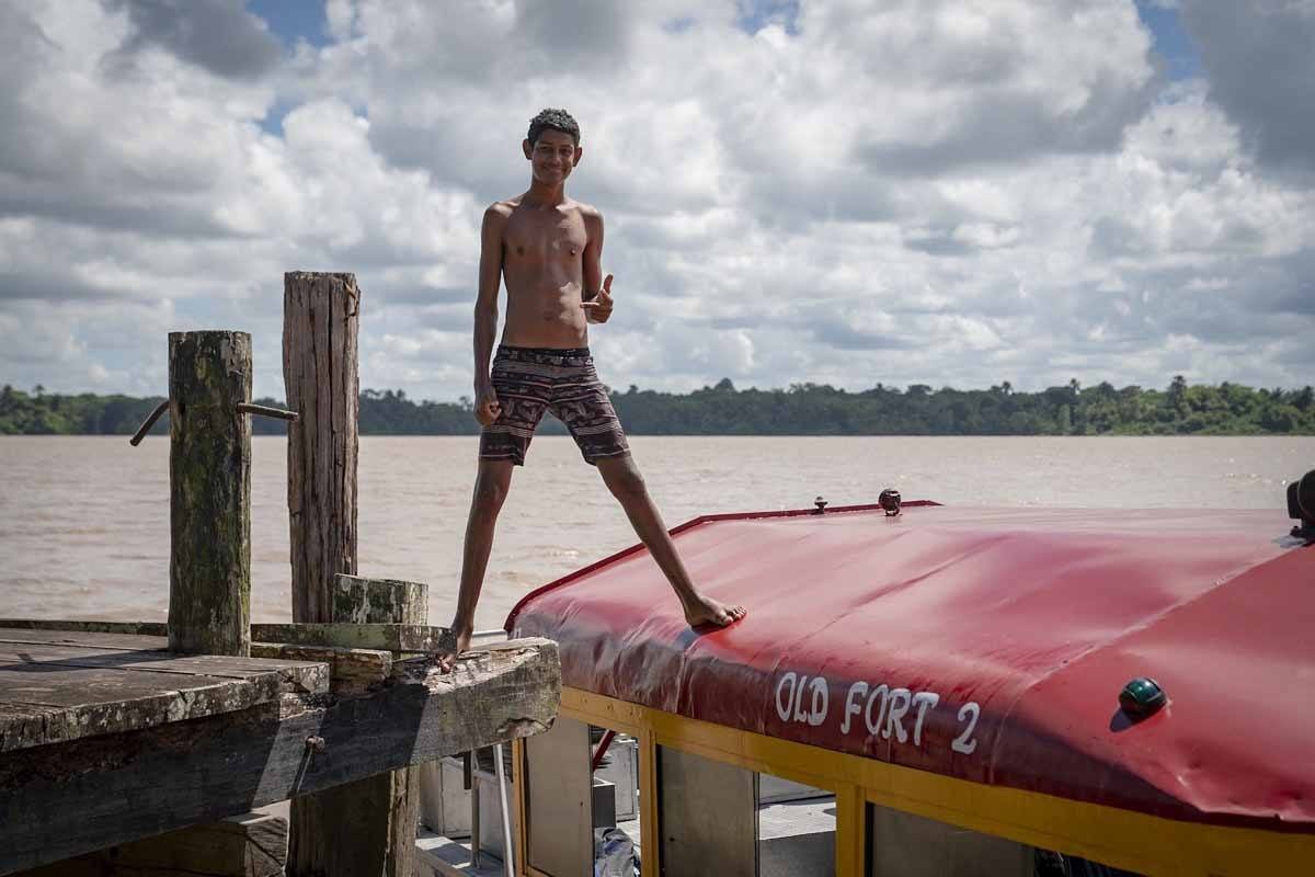 essequibo river local boy guyana