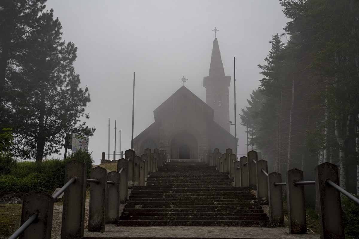 The tiny church on Cisa Pass in the fog